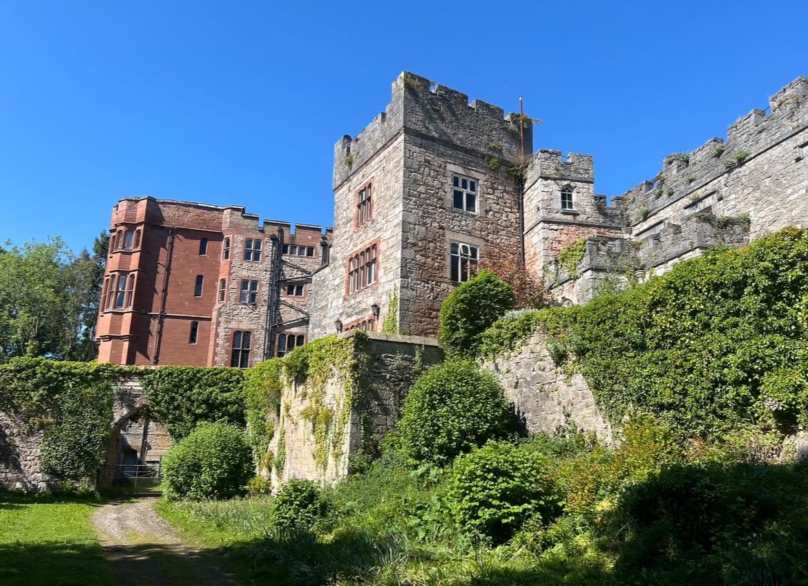 Ruthin Castle towers and battlements on a sunny day
